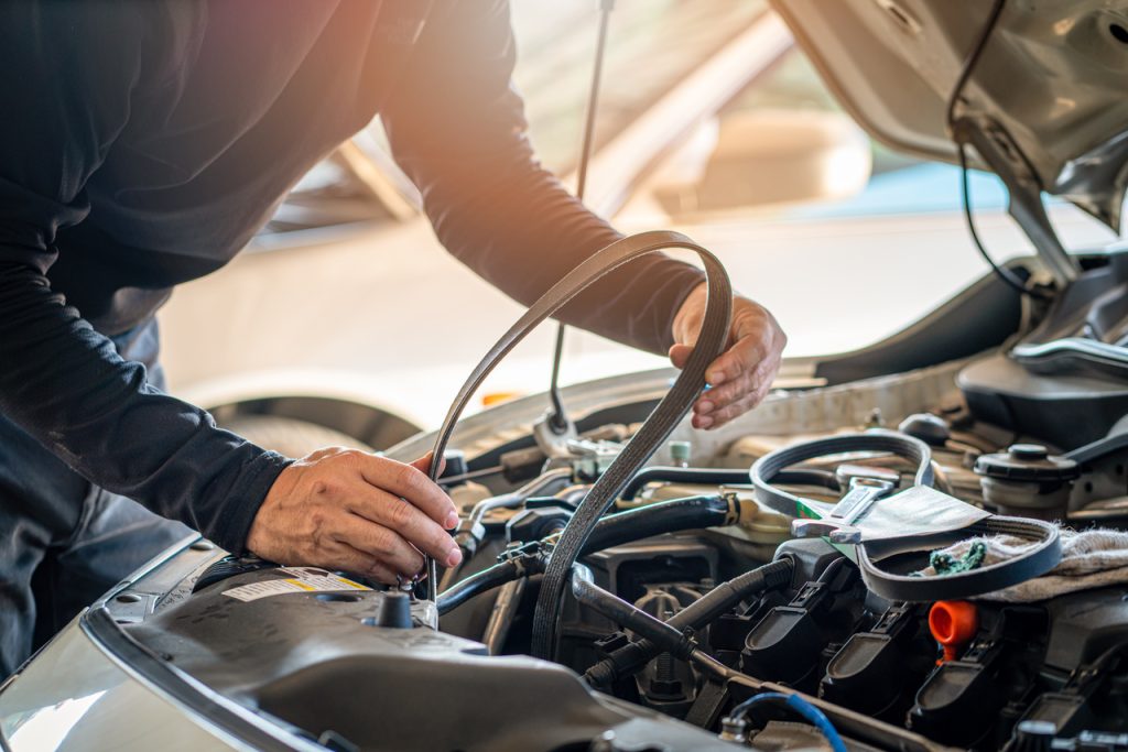 holding timing belt of a car for repair