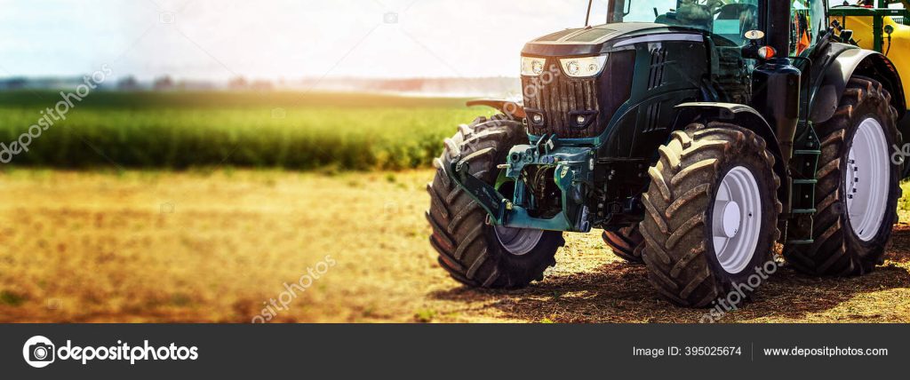 agricultural machinery farm equipment tractor standing on the
